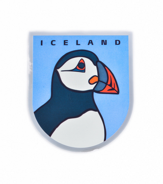 Sticker with a puffin design and 'Iceland' text on a blue background