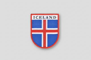 Icelandic flag patch with 'ICELAND' text on a white background