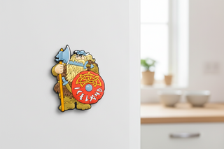 Viking character holding an axe and a shield with 'Iceland' text on a white background
