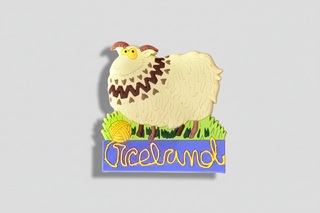 Sheep-shaped magnet with 'Iceland' text on a white background