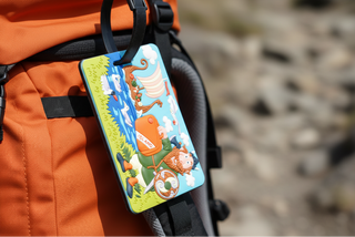 Cute Iceland Viking luggage tag showing a smiling Viking traveler with an orange suitcase, playful Nordic adventure design
