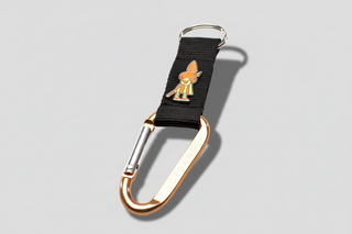 Iceland Viking carabiner keychain with black strap, bronze metal clip, and Viking character charm