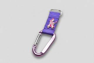 Icelandic elf carabiner keychain with purple strap, purple metal clip, and elf folklore charm