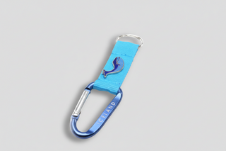 Iceland whale carabiner keychain with blue strap, blue metal clip, and whale charm