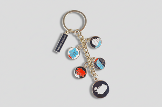 Metal Iceland souvenir keyring featuring natural elements and island map design