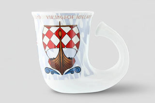 Vikings of Iceland glass mug with Viking longship and shield design and horn-shaped handle, Iceland souvenir drinking mug.