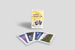 Pack of Icelandic playing cards with scenic images on a white background