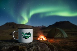 Camping scene with Northern Lights, campfire, and 'Iceland' mug.