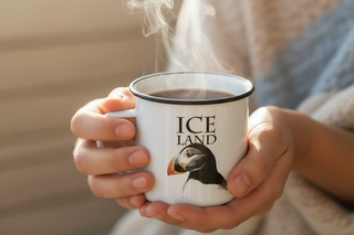 Mug with puffin design and 'Iceland' text on a white background