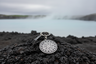 Metal Iceland souvenir keyring featuring Tree of Life symbol in round pendant