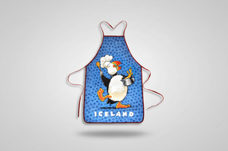 Children's apron with a cartoon penguin chef design on a blue background