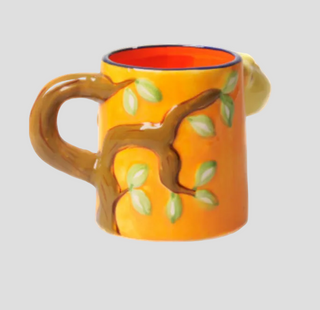 Iceland sheep mug with cute 3D sheep design, orange interior labeled “Iceland,” and brown handle, fun Iceland souvenir coffee cup