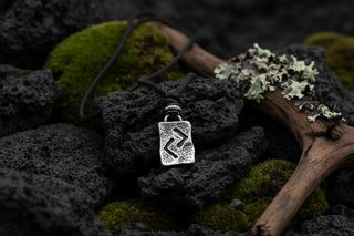 Silver-tone Icelandic Jára rune pendant necklace on black cord, Viking rune symbol for harvest and reward