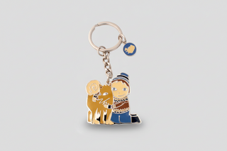 Keychain with a character and dog  on a white background