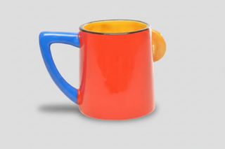 Iceland Viking gnome mug with colorful 3D bearded character holding shield and sword, red mug body, blue handle, and yellow interior labeled “Iceland.”