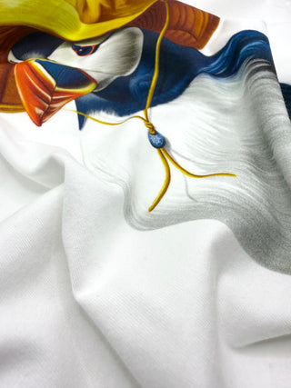 Colorful fabric design with a stylized face on a white background