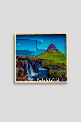 Square framed artwork of a mountain and waterfall with 'Iceland' text on a white background