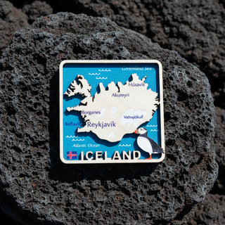 Map of Iceland with a puffin illustration on a blue background