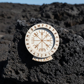 Decorative item with Runes and 'ICELAND' text on a white background
