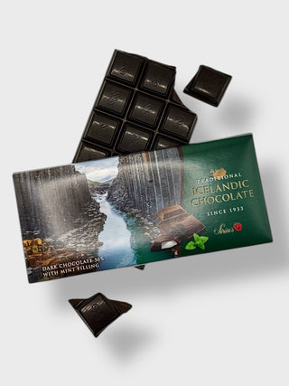 Traditional Icelandic dark chocolate 56 percent with mint filling, partially unwrapped, showing dark chocolate squares and canyon-inspired packaging
