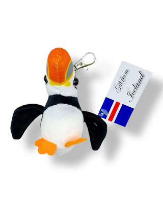 Plush puffin keychain with a tag indicating 'Gift from Iceland' on a white background