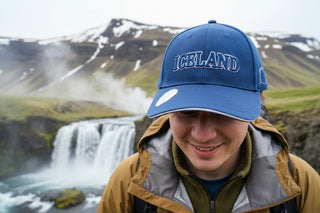 Blue cap with 'ICELAND' text on a light gray background