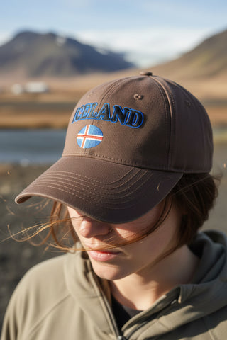 Brown cap with 'ICELAND' and Icelandic flag on a light gray background