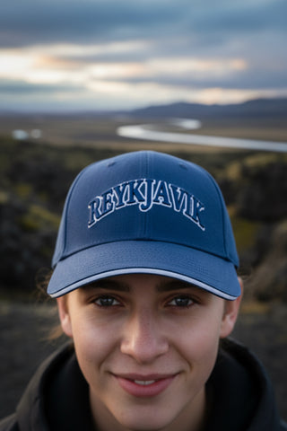 Blue cap with 'Reykjavik' text on a light gray background