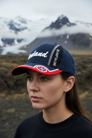 Navy blue cap with 'Iceland' and Reykjavik branding on a light gray background