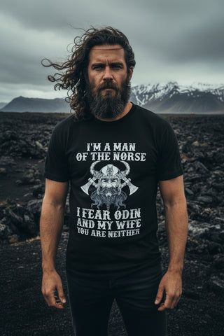 Black t-shirt with white text and graphic design on a light gray background