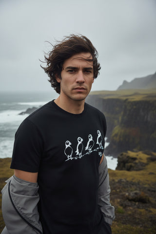 Black t-shirt with white graphic design on a white background