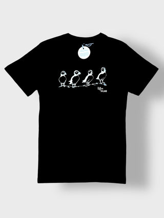 Black Iceland puffin t-shirt with white minimalist illustration of four puffins and “Puffins Iceland” text on the chest