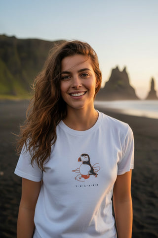 White Iceland T-shirt with minimalist puffin illustration and small Iceland lettering on the front