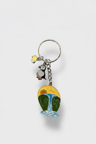 Colorful Iceland puffin keychain with enamel waterfall landscape charm and sunset background souvenir from Iceland