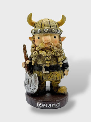 Cute Icelandic Viking figurine with braided beard holding a battle axe and wearing a horned helmet