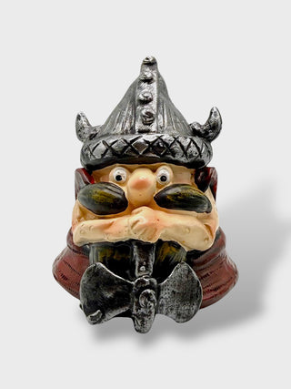 Funny Icelandic Viking warrior statue with giant moustache, horned helmet, and battle axe