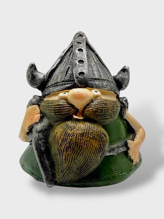 Funny Icelandic Viking warrior statue with giant beard, horned helmet, and battle axe