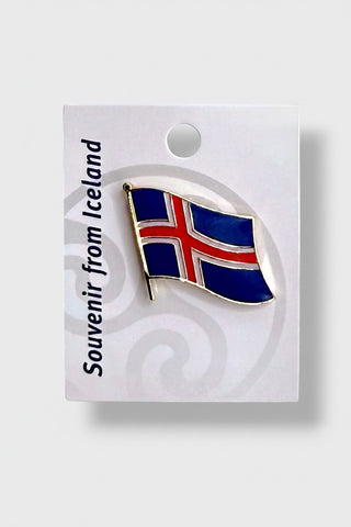 An Iceland flag enamel lapel pin mounted on a white display card. The card features the text 'Souvenir from Iceland' 