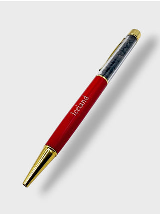 Red pen with gold accents on a white background