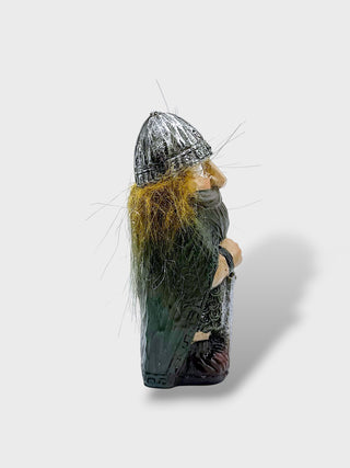 Hand-painted polyresin Icelandic Viking figurine with a silver helmet, long beard, detailed armor, and both hands resting on a large sword, 8 cm (3.15 in) tall.