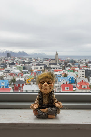 Hand-painted polyresin meditating Icelandic troll figurine sitting cross-legged with closed eyes, fluffy hair, and open hands, 11 cm (4.33 in) tall.