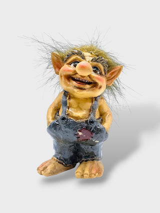 Hand-painted polyresin Icelandic troll figurine wearing grey overalls with fluffy hair, pointed ears, and a cheerful smiling face, 9 cm (3.54 in) tall.

