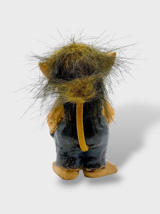 Hand-painted polyresin Icelandic troll figurine wearing grey overalls with fluffy hair, pointed ears, and a cheerful smiling face, 9 cm (3.54 in) tall.
