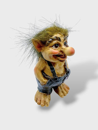 Hand-painted polyresin Icelandic troll figurine wearing grey overalls with fluffy hair, pointed ears, and a cheerful smiling face, 9 cm (3.54 in) tall.

