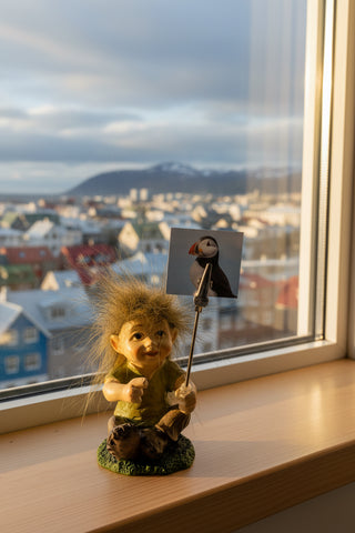 Hand-painted polyresin Icelandic elf memo clip holder with green clothing, detailed facial features, and a metal photo clip, 6 cm (2.36 in) tall.