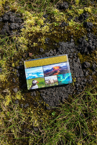 Iceland glitter souvenir magnet featuring volcano, glacier, waterfall, Icelandic landscapes and moving gold glitter