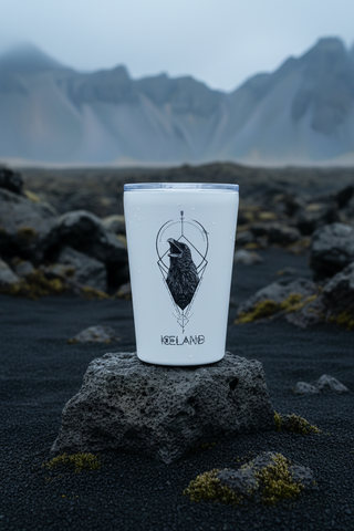 White tumbler with a black geometric design of a bird and 'Iceland' text on a white background
