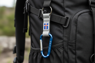 Iceland carabiner keychain with blue metal clip, Iceland flag strap, and engraved Iceland text
